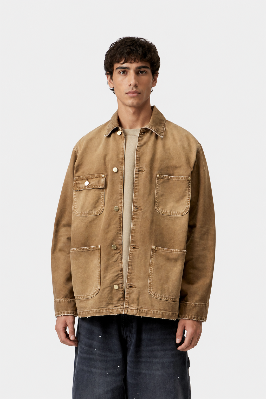 Model wearing a men's Hamilton Brown destroy wash chore coat with relaxed workwear styling